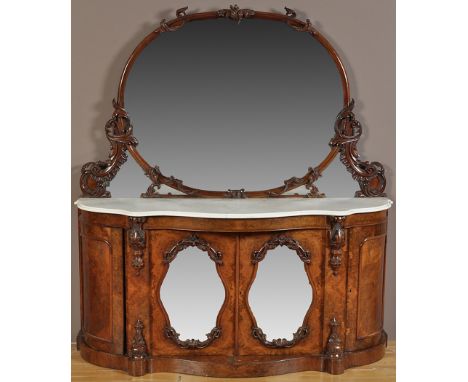 A Victorian burr walnut and marble topped serpentine sideboard, the mirrored back surrounded by acanthus scrolls, the base fi