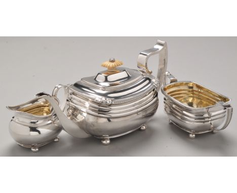 A George III silver teapot, possibly by Crispin Fuller & Charles Fox, London 1814, shaped rectangular, with straight gadroon 