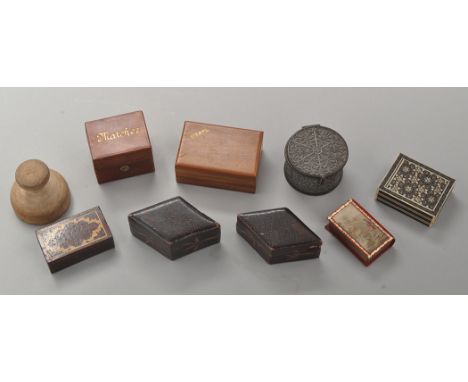 A Victorian leather and metal matches case; a late 19th Century fruit wood stamps box; leather covered and velvet lined book-