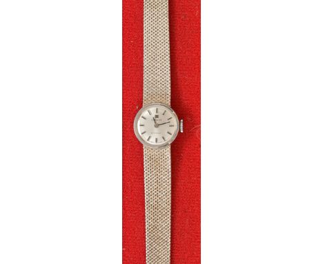 Tissot Stylist: a lady's 18ct. white gold bracelet watch, early 1970's, with circular baton dial, mesh pattern strap, weight 