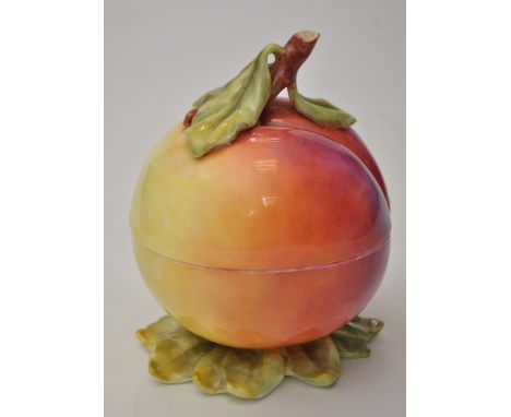Royal Worcester peach shaped preserve jar and cover, signed "H Ayrton, realistically painted with short branch stem having th