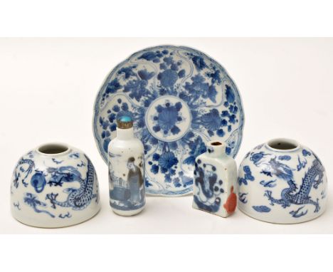 Small Chinese blue and white saucer dish, moulded panel sides with flower sprays, square diaper mark to base, diameter 13cm; 