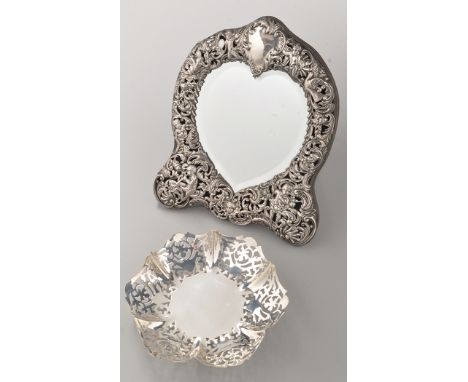 A Victorian silver mounted and easel backed dressing table mirror, maker's mark worn, London 1895, heart-shaped bevelled plat