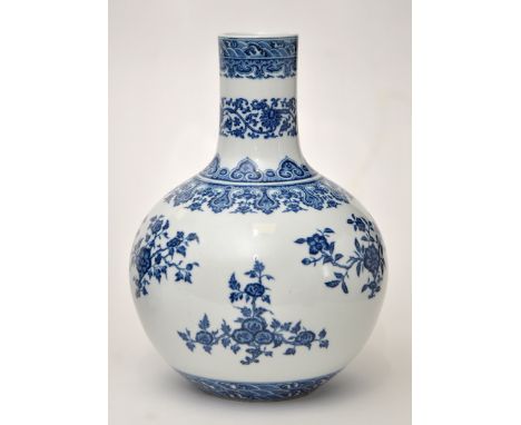 Chinese blue and white ovoid-shaped vase, with fruit and floral sprays arranged within two registers beneath foliate and ruyi