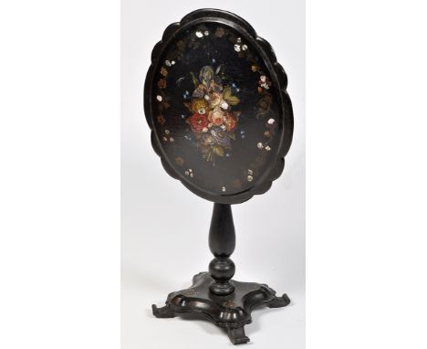 A Victorian black lacquered papier mache table, the shaped oval top with painted floral bouquet and inlaid mother-of-pearl, r