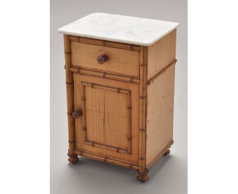 A late 19th Century miniature marble top pine pot cupboard, the white marble top above a single drawer and panel door, decora