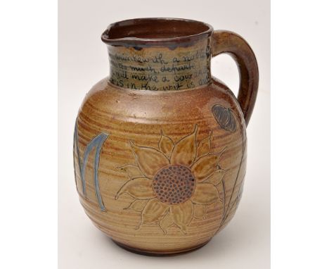 Martin Brothers stoneware jug, signed RW Martin, flattened ovoid shaped body incised with sunflowers and initial "M" on gradu