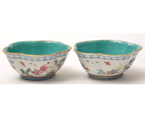 Pair of Chinese famille rose penta-lobed bowls, turquoise interiors and base recesses, the sides with fish swimming amongst a