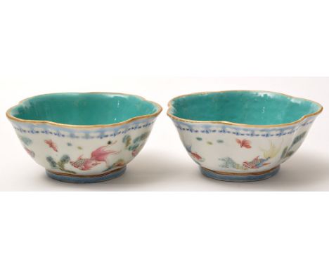 Pair of Chinese famille rose penta-lobed bowls, turquoise interiors and base recesses, the sides with fish swimming amongst a