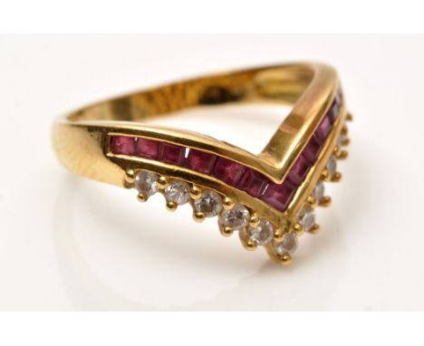 A ruby and diamond ring, set with graduated square facet cut rubies in channel setting and brilliant cut diamonds in claw set