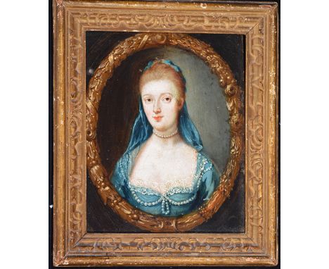 18th Century British SchoolA miniature bust portrait of a lady wearing a blue pearl-trimmed dress, in painted oval cartouche,