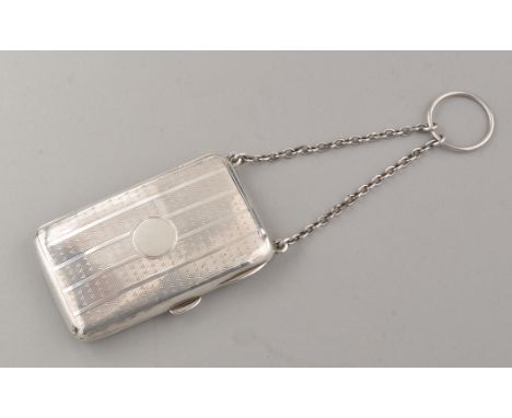 A George V engine turned silver combination powder compact and sovereign case, by Mappin & Webb, Birmingham 1915, with suspen
