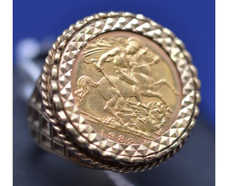 An Elizabeth II gold half sovereign, 1982, in 9ct. yellow gold ring mount, ring size M, 8.7grms.