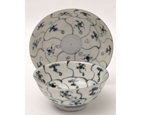 Chinese blue and white bowl and saucer dish from the 'Tek Sing Treasures' each with spiral form panel designs, bowl diameter 