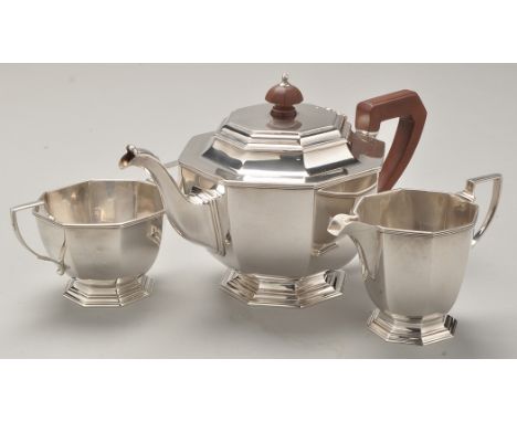 A George V three-piece silver tea service, by Mappin & Webb, Sheffield 1933, each piece of shaped octagonal form, the teapot 