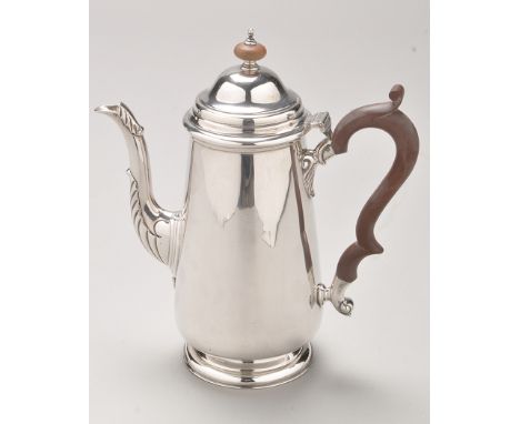 A George V silver coffee pot, by S.W. Smith & Co., Birmingham 1924, in the Georgian taste and of tapering form, leaf wrapped 