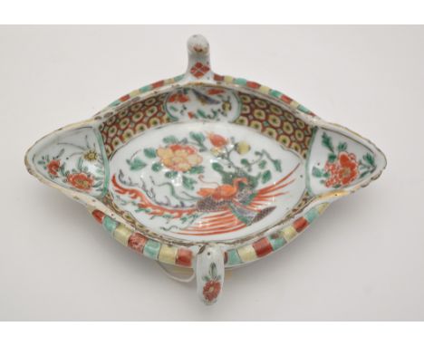 Chinese Famille Verte sauce boat, of diamond shape with twin handles and two spouts, painted with Phoenix in flight amidst fl