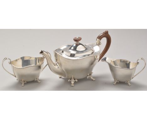 A George VI three-piece silver tea service, by William Suckling Ltd., Sheffield 1945, each piece of oval form, with undulatin