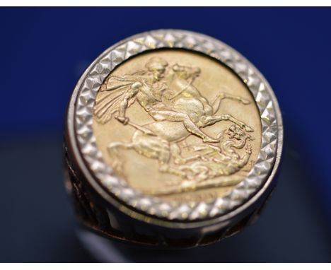 A George V gold sovereign, 1911, in 9ct. yellow gold ring mount, ring size P, 15.3grms.