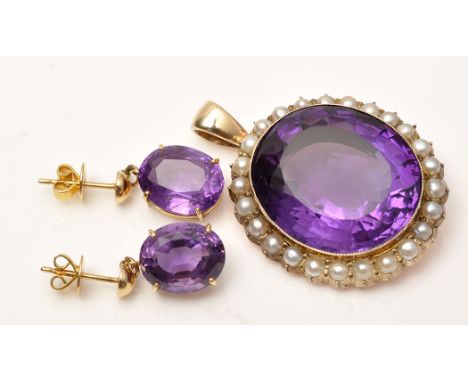 An amethyst and half pearl pendant, the oval facet cut amethyst measuring 25 x 21 x 11mm, estimated to weight 30.00 carats, s