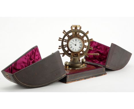 Elkington & Co: a rare novelty revolving ships wheel desk clock/barometer, each side is modelled as a brass ships wheel, with