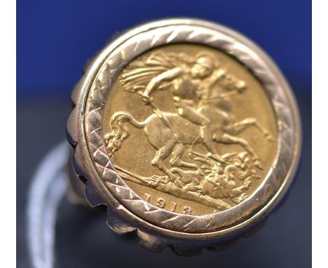 A George V gold half sovereign, 1913, in 9ct. yellow gold ring mount, ring size K, 9.3grms.