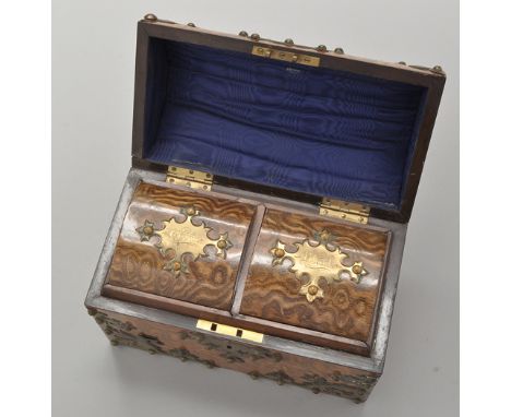 A Victorian burr walnut and brass mounted dome topped tea caddy, opening to reveal two sliding covers, inscribed "Green" and 