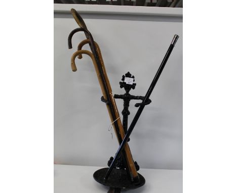 A reproduction cast stick stand and contents Collection only 
