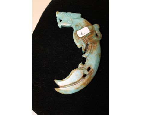 A green jade amulet 