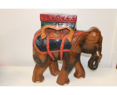 A solid wooden elephant planter stand. 48cm x 49cm Collection only 