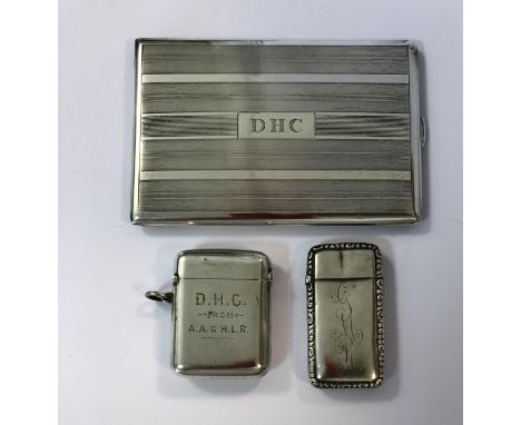 the vesta, Chester 1908, of rectangular form with spring hinged cover, gilded interior, strike to the base and suspension rin
