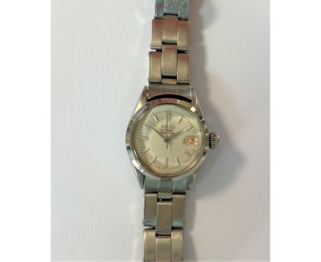 c1958, model 6516, serial number 381066, the signed off white dial, 20mm diameter, with silvered batons and hands, blued cent