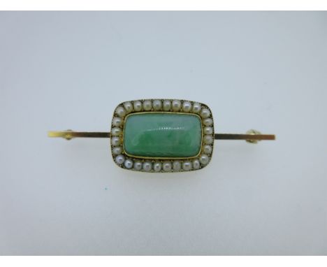 the rectangular cabochon jade collet set to a seed pearl border, the back engraved 'In memory of C.Wood, Ob't Feb. 21 1830, Æ