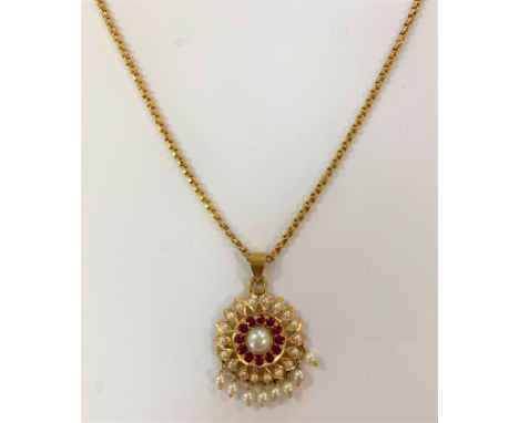 the circular drop pendant consisting of a central 5.5mm cultured pearl, surrounded by twelve grain set synthetic round facete