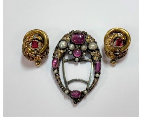 the first, a pair of hollow twisted carved earstuds, each set with a cushion faceted ruby doublet and two seed pearls, unmark
