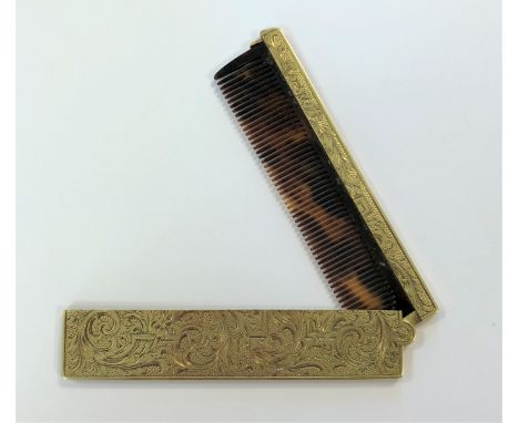 the tortoiseshell coloured comb with hinged cover decorated with floral engraving over a textured field, stamped '750' and wi