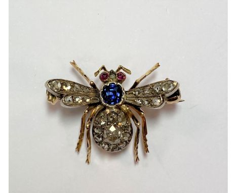 the thorax with a cushion faceted sapphire, estimated approximate weight 0.30ct, the abdomen with a central old cushion cut d