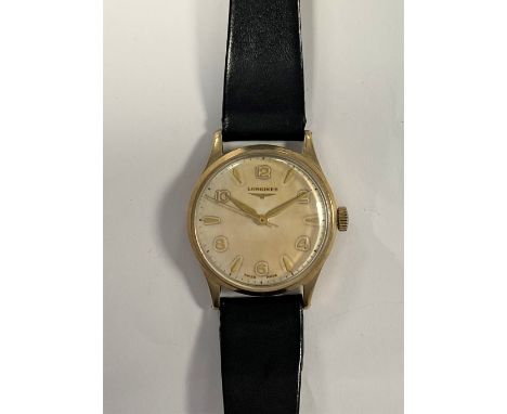 c1956, the signed silvered dial, 32mm diameter, with alternate gold coloured Arabic numerals and batons, gold coloured hands 