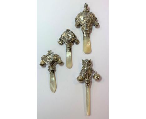 all of hollow construction with attached pairs of bells and mother of pearl handles, the first by W H Collins &amp; Co, Glasg