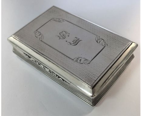 Birmingham 1844, of rectangular form, engine turned base with piano hinged cover to match around a monogrammed central rectan