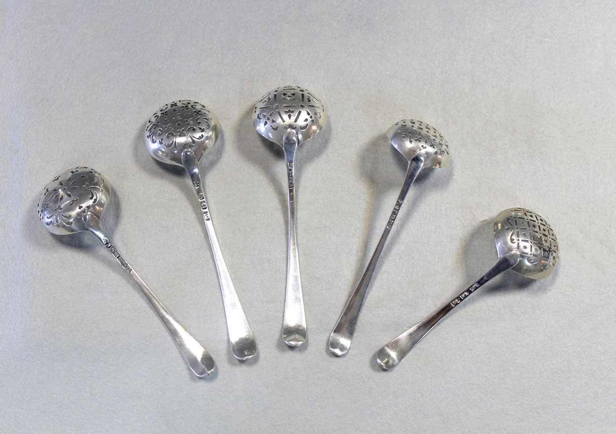 A II silver sugar sifting spoon together with four early