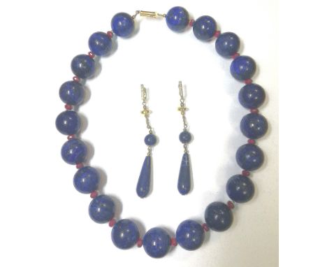 the 10mm round lapis lazuli beads are strung with faceted ruby rondel spacers, silver gilt push-in clasp, length 51cm, togeth