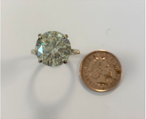 round brilliant cut diamond of approximately 13.1 x 13.0 x 7.7mm, with an estimated weight 8.50ct, diamond colour assessed as