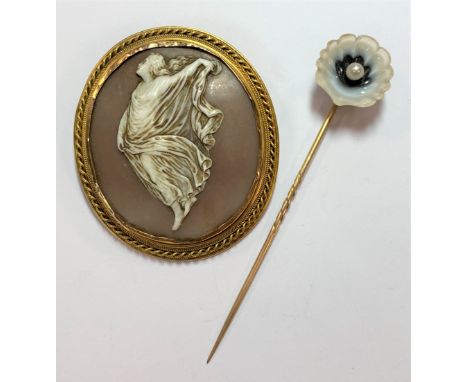 the chocolate brown shell cameo with an image of a long haired female wearing a long flowing dress, rope twist mount, pin and