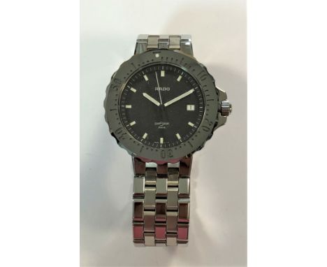 c2004, model 259.0461.3, the signed black dial, 30mm diameter, with luminous batons and hands, centre sweep and date window a