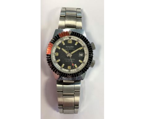 c1970, the signed black dial, 33mm diameter, with (originally) luminous batons and hands, centre sweep with orange terminal, 