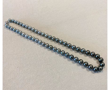 fifty three pearls, graduating from 8.5 to 11mm in diameter, of natural colour and graduating from dove grey to almost black 