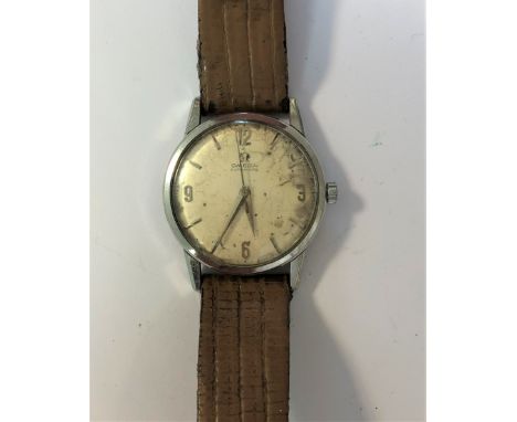 c1961, model number 14748-1-SC, the cream coloured dial, 29mm diameter, with silver coloured batons, quatre Arabic numerals s