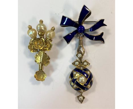 the first, a floral spray brooch with three (possibly natural) pearl terminals, pin and hook fitting, overall length 4cm, unm