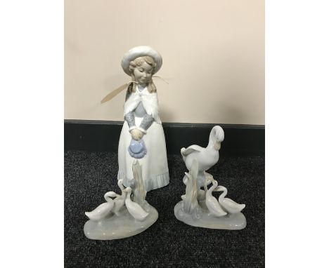 Three Nao swan figures and one girl  figure (4) 